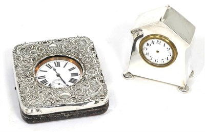 Lot 126 - A silver cased desk timepiece and a silver mounted travelling cased timepiece, nickel plated...