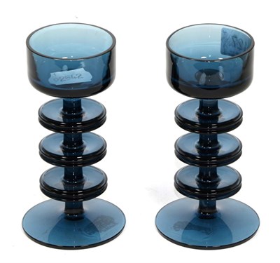 Lot 127 - A pair of King's Lynn glass Sheringham pattern candlesticks, designed by Ronald Stennett...