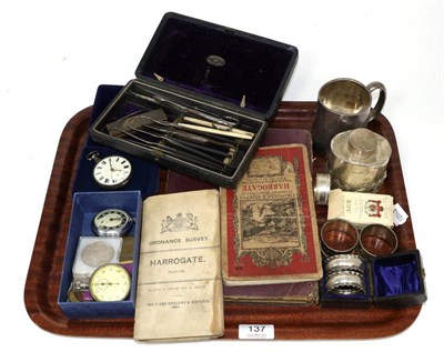 Lot 137 - A silver christening mug, silver caster, silver napkin rings, three pocket watches, collectors...