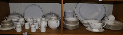 Lot 153 - A Royal Worcester ";Contessa"; pattern dinner/tea service (two shelves)
