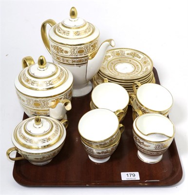 Lot 179 - Minton tea service for six in gold Argyle pattern
