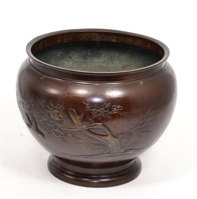 Lot 184 - Japanese Meiji Period bronze jardiniere, decorated with flowers and trees