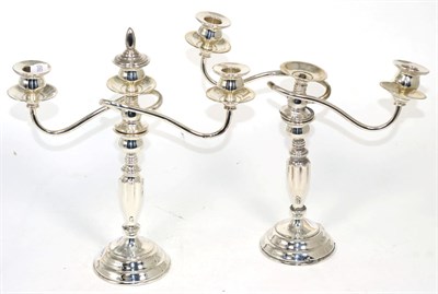 Lot 197 - A pair of Danish sterling candelabra, 20th century, (one sconce missing) (2)