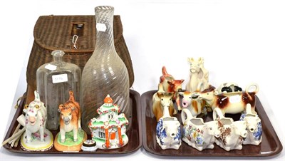 Lot 204 - A small group of late 19th/20th century cow creamers, a Victorian pastel burner, a photograph...