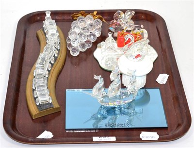 Lot 207 - Various Swarovski crystal ornaments including locomotive and five carriages, grapes, Santa's...