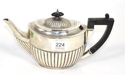 Lot 224 - A silver teapot, William Hutton, Sheffield 1915, 25.5cm long, 16ozt