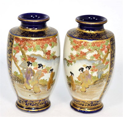 Lot 234 - A pair of Satsuma earthenware blue ground vases