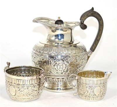 Lot 236 - A Victorian composite three-piece silver bachelor's teaset, teapot marks rubbed, retailed by Reid &