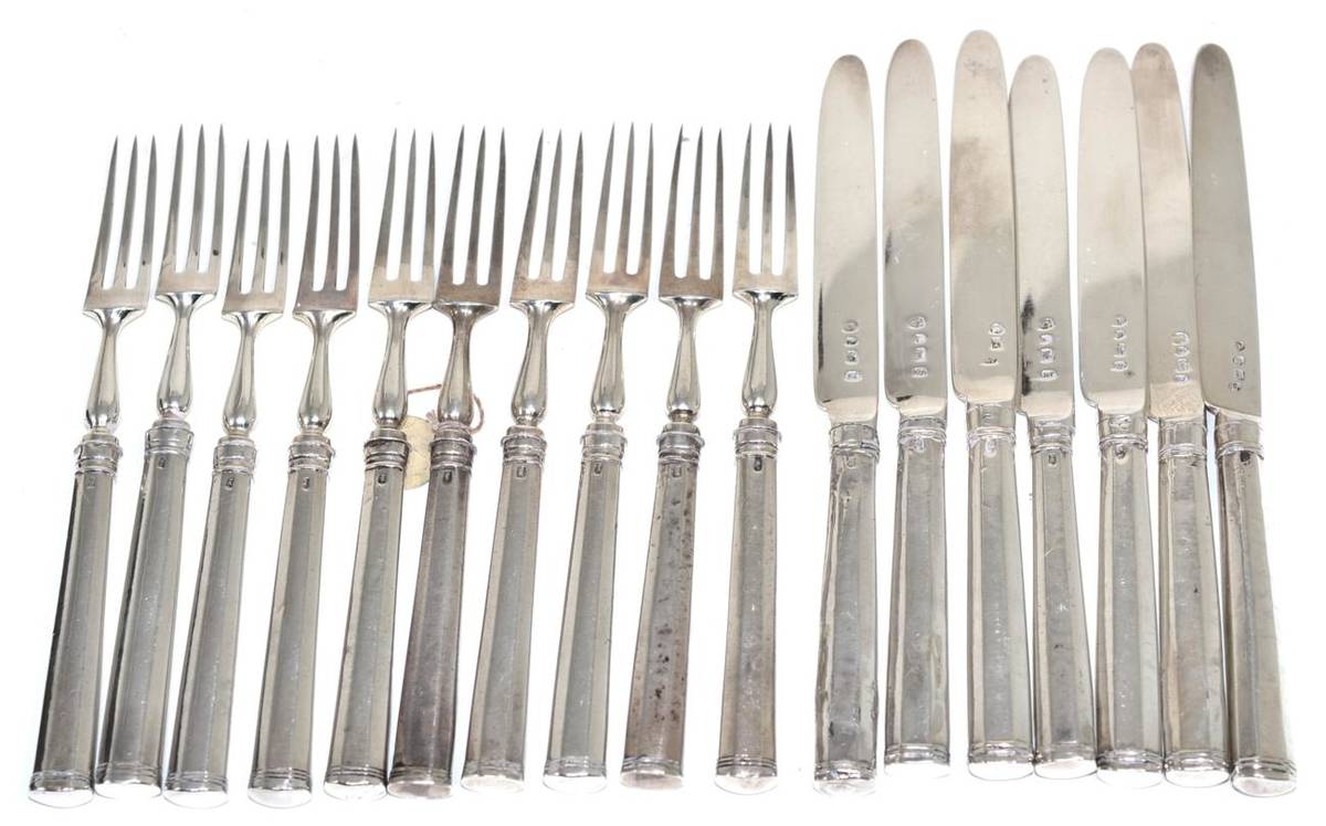 Lot 251 - A part set of George III silver fruit knives and forks, the knives Robert Trickett & Co, Sheffield