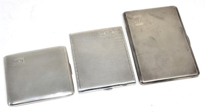 Lot 260 - Three various engine turned silver cigarette cases, the largest 13cm long, 14.6ozt