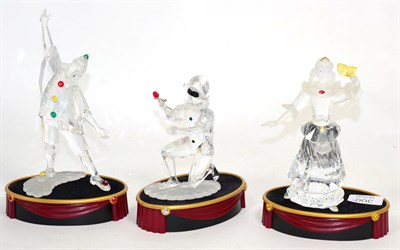 Lot 300 - Three Swarovski crystal figures from the Masquerade Collection, 'Pierrot', 'Columbine' and...