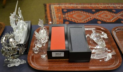 Lot 302 - Four Swarovski crystal ornaments including 25th anniversary dragon, Pegasus, unicorn and...