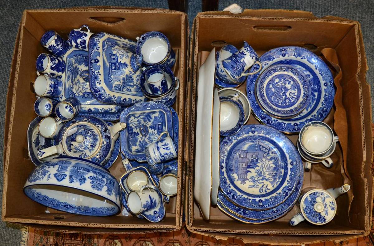 Lot 1018 - A large assortment of blue and white Willow pattern wares, mostly Burleigh ware (two boxes)