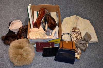 Lot 1035 - Assorted costume accessories, including a grey fur muff, mink hats, other hats, brown suede handbag