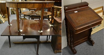 Lot 1070 - An early 19th century mahogany drop leaf gateleg table, a mahogany demi lune side table and an...