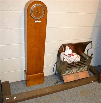Lot 1106 - An electric copper backed fire and a metal fire fender and an Art Deco small longcase clock