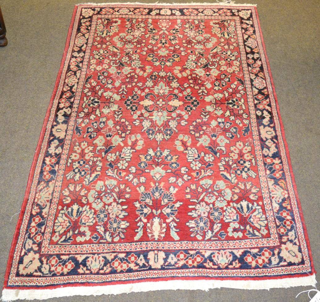 Lot 1178 - A Saroukh rug, West Iran, the strawberry field of flowering plants enclosed by narrow borders,m 152