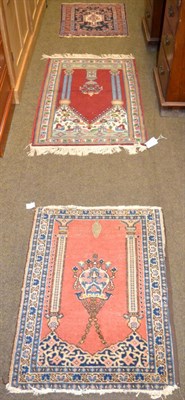 Lot 1180 - Anatolian Prayer mat, the claret field beneath a stepped Mihrab enclosed by narrow borders, 90...