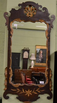 Lot 1196 - A George III parcel gilt mahogany fret work mirror