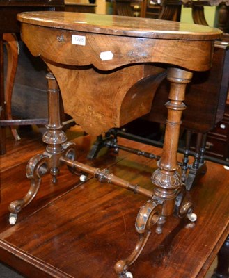 Lot 1228 - A Victorian burr walnut veneered inlaid sewing table