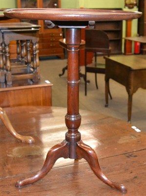 Lot 1235 - A small George III style mahogany tripod table