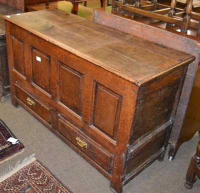 Lot 1237 - An 18th century oak mule chest