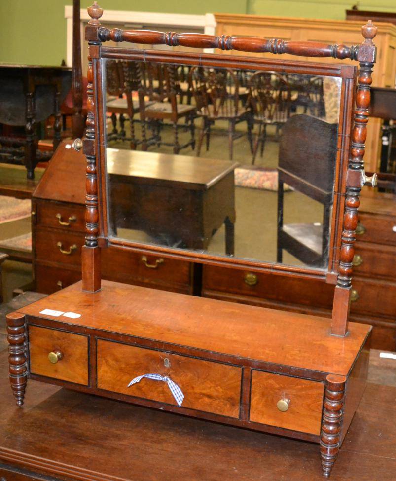 Lot 1243 - A 19th century mahogany table mirror