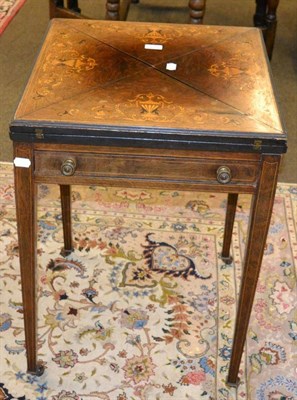 Lot 1249 - A Victorian rosewood inlaid folding top card table