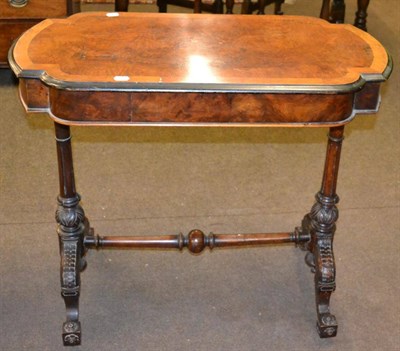 Lot 1253 - A Victorian burr walnut veneered and ebonised side table
