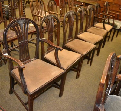 Lot 1254 - A set of six George III style dining chairs comprising four dining chair including two carvers