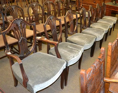 Lot 1255 - A set of eight Hepplewhite style mahogany shield back dining chairs including two carvers,...