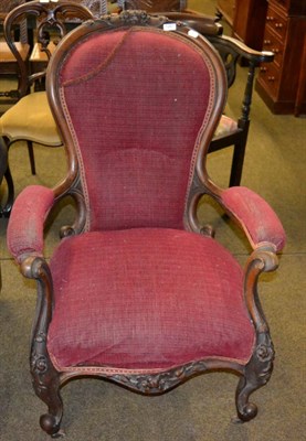 Lot 1261 - A Victorian mahogany carved armchair