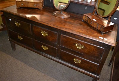 Lot 1269 - An oak low dresser comprising six drawers, 18th century and later