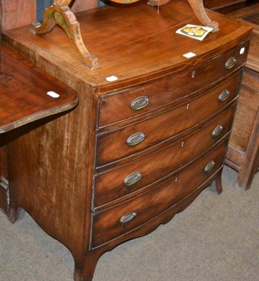 Lot 1294 - A small mahogany four height bow fronted chest of drawers