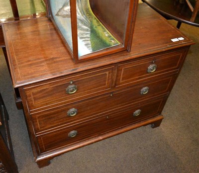 Lot 1297 - A mahogany chest of drawers with two long drawers and two short drawers