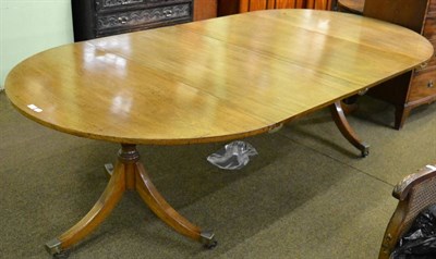 Lot 1337 - A George III and later mahogany twin pedestal D-end dining table