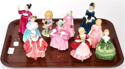 Lot 7 - Nine small Royal Doulton figures including an early Goody Two Shoes HN2057 and a Goebel figure (10)