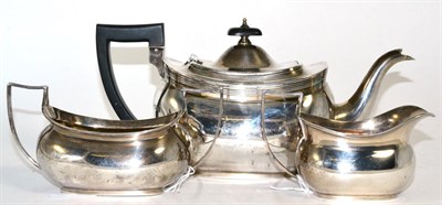 Lot 11 - A three piece silver tea set marked for Chester