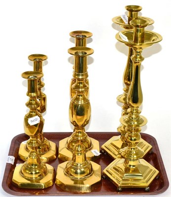 Lot 21 - Three pairs of brass candlesticks (6)