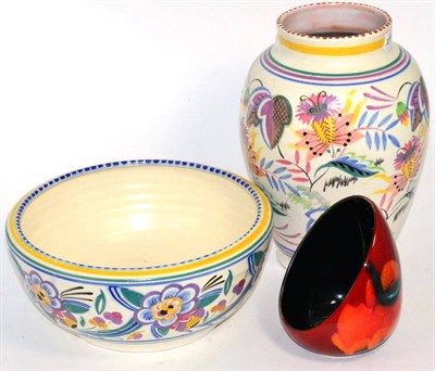 Lot 22 - A Poole pottery vase, bowl and a salt (3)