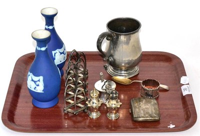 Lot 30 - A small group of silver items comprising: mustard pot; napkin ring; cigarette case; teaspoon...