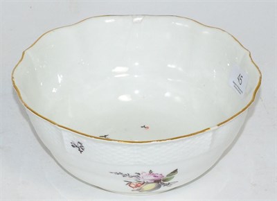 Lot 45 - A Meissen porcelain Ogee bowl, circa 1750, painted with flower sprigs within an ozier border,...