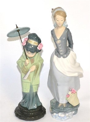 Lot 49 - Two Lladro figures including Japanese girl with parasol (2)