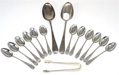 Lot 51 - A set of twelve silver teaspoons with bright cut decoration and a matching pair of sugar tongs,...