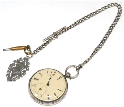 Lot 56 - A silver open faced pocket watch with attached silver chain and silver fob