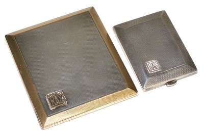 Lot 57 - A silver slide action cigarette case with silver gilt border and interior, monogrammed RAS together
