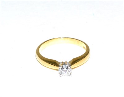 Lot 89 - An 18 carat gold solitaire diamond ring, a round brilliant cut diamond in a claw setting, to...