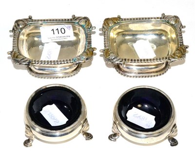 Lot 110 - Two pairs of Georgian silver salts, one pair with blue glass liners (4)
