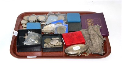 Lot 121 - A silver mesh purse, silver plated oval shaped purse, and a quantity of coins including a...