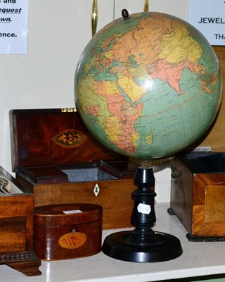 Lot 134 - A 12 inch Terrestrial globe by W & A.K. Johnston Edinburgh, on ebonised stand together with a...